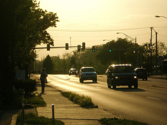 Commuters on Olive Boulevard.
