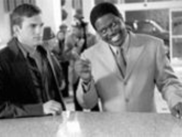Fatherly advice: Bernie Mac (right) tells Ashton 
    Kutcher (left) a thing or two.