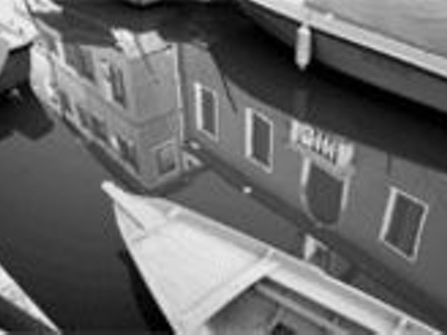 Is that a gondola in your canal, or are you just happy 
    to see Stewart D. Halperin's photo exhibit on Friday?