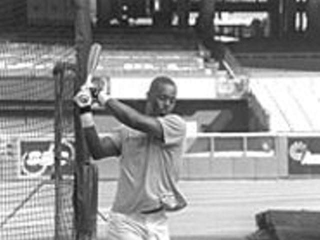 Edgar Renteria warms up October 10 before the Cardinals' final home playoff game. Former Redbird GM Bing Devine says he considers Renteria the best shortstop in the National League.