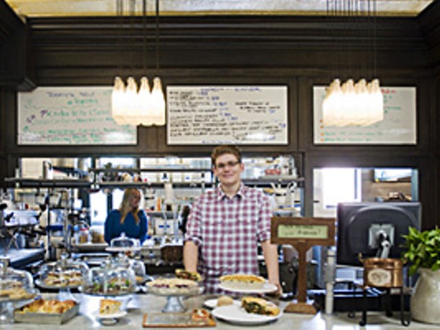 Sweet Home: Barista Kevin Maffitt and a few of Winslow's many baked goods.