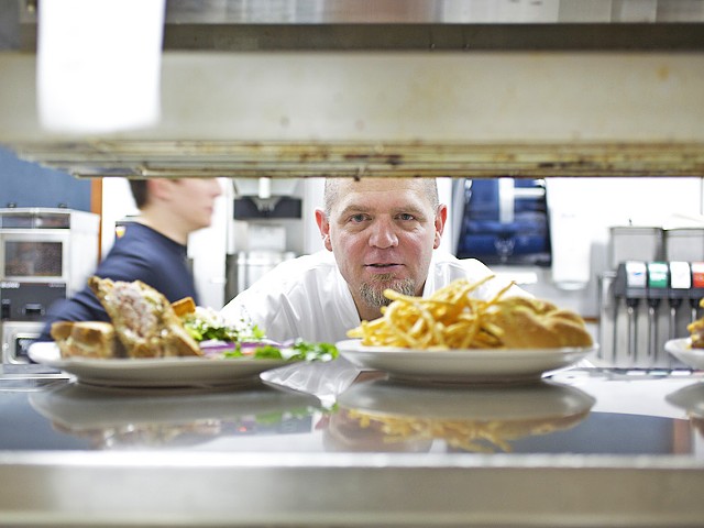 Jeff Constance oversees the lunch items as they make their way out to the floor.