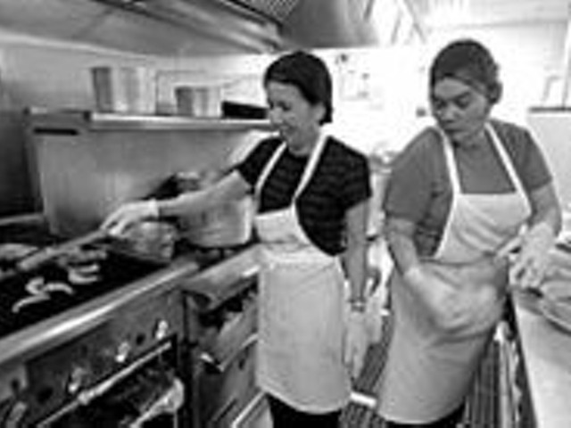 Winning Seasons: Owner/chef Nguyen Pham (left) and employee Phuong Dao help revitalize South Grand
