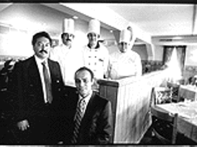 Alea's Place staff (clockwise from front): managers Masoud Banankhah and Mike Hojreh, chef Davood Ahmadian, owner/chef Reza Ahmadian and chef Thomas Martoccio