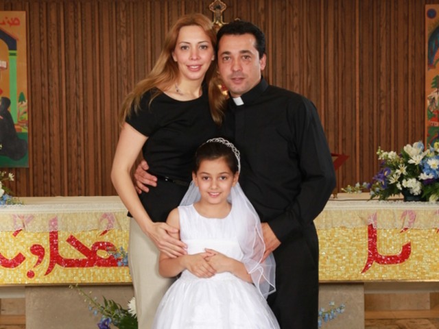 Deacon Wissam Akiki with his wife, Manal, and daughter, Perla.