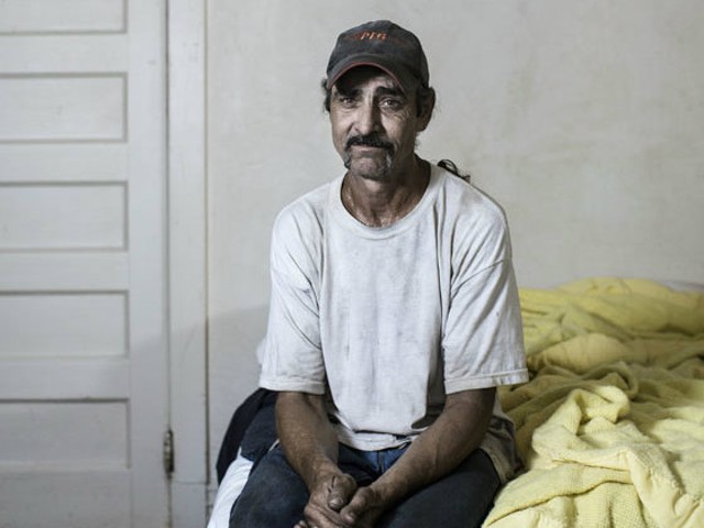 Robert Cook, a resident at the Mark Twain, in his room. He was released from prison in 2012 and now works as a warehouse manager.