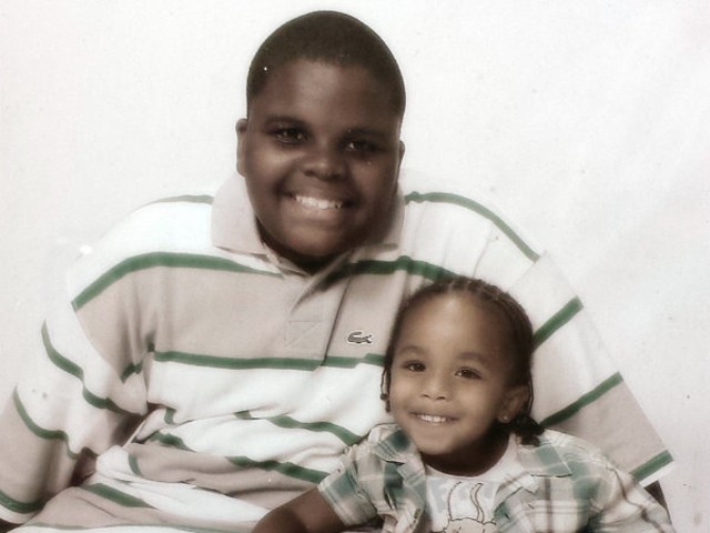 Michael Brown at sixteen with his younger brother Andre.