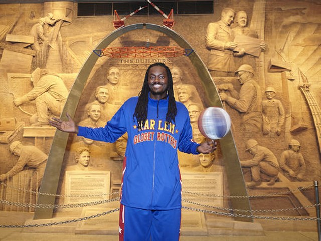 Slick Willie Shaw of the Harlem Globetrotters is pretty darn tall. Not quite as tall as the Gateway Arch, but tall. See more photos.