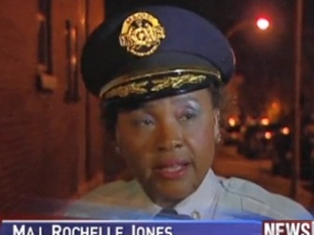 An officer talks to reporters after last night's shooting. Video below.