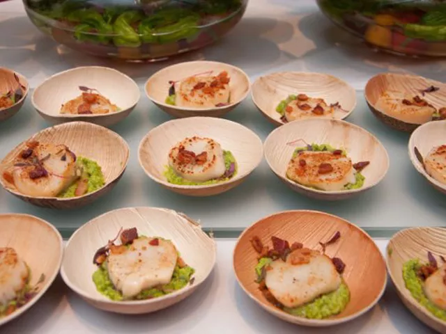 Seared sea scallops with minted pea pesto, applewood smoked bacon and micro red amranth from Central Table Food Hall at last year's event. | Micah Usher