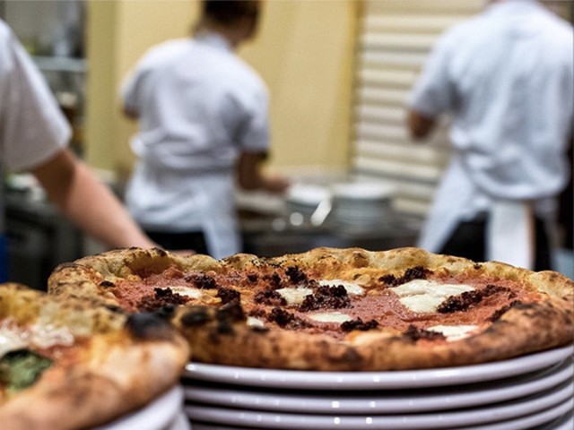 Pizza at Pastaria. | Instagram/@whiskeyandsoba