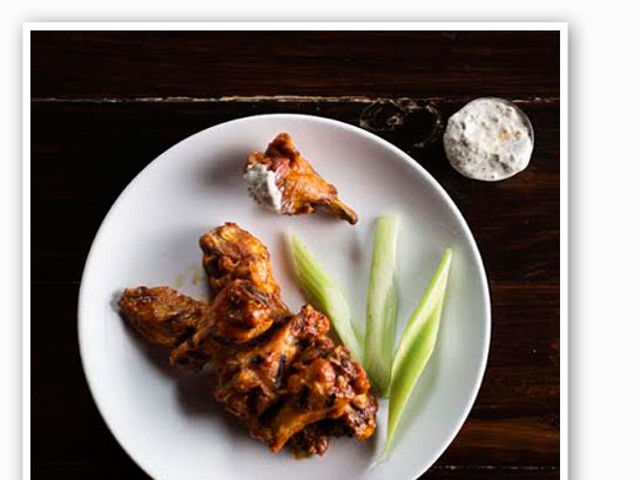 &nbsp;&nbsp;&nbsp;&nbsp;&nbsp;&nbsp;&nbsp;The Precinct's wings, one of the dishes that will stay on the new menu. | Jennifer Silverberg