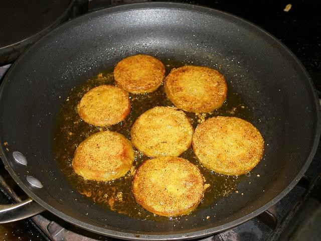 Green tomatoes, frying.