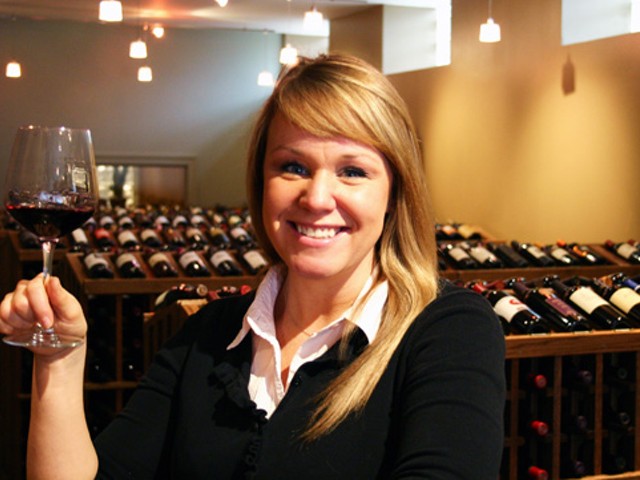 Renee Skubish of West End Wines demonstrates the best part of her job.