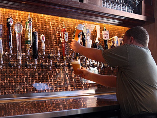 Pouring a beer at the new Flying Saucer | Kaitlin Steinberg
