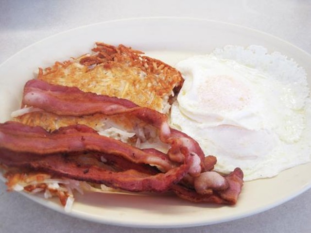 Two eggs over-easy with bacon and hash browns at the Courtesy Diner