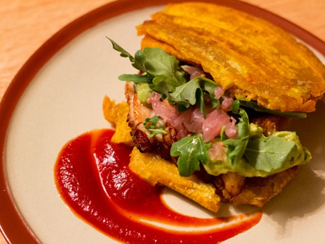 El Jibarito, a fried plantain "sandwich" with pork belly, tomato-chipotle jam, avocado and pickled red onion.