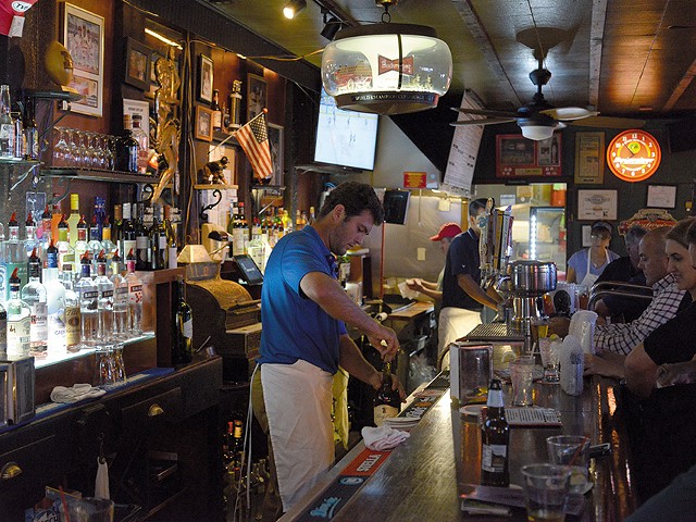 The Village Bar: One of the neighborhood bars we love.
