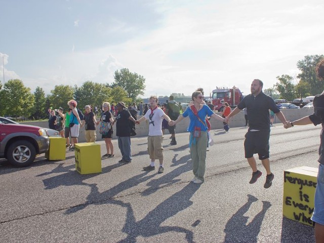 More than 60 protesters were arrested Monday after blocking rush-hour traffic on I-70.
