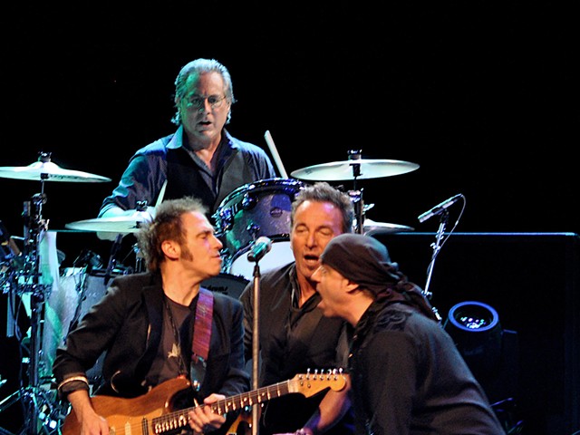 Springsteen and his E Street buddies — Lofgren is on the left.