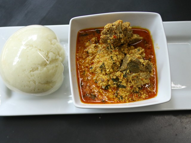 Eugsi Soup- Goat meat soup served with pounded yam.
