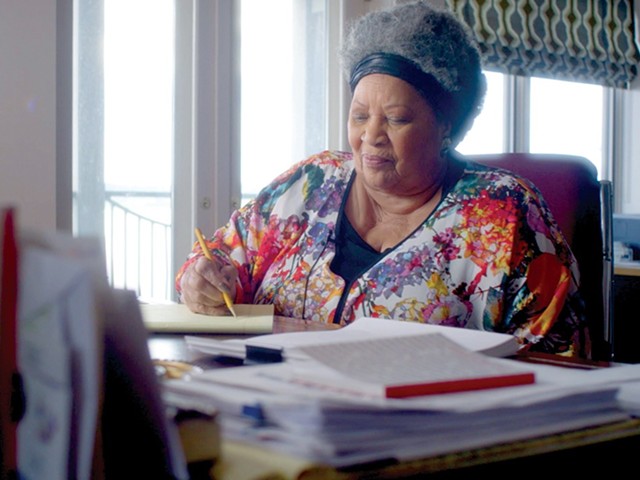 Toni Morrison doing what she does best: writing and thinking.