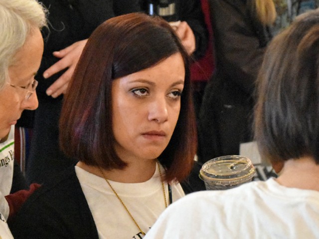 Carly Garcia tears up after learning ICE wouldn't review her husband's application for a stay of deportation.