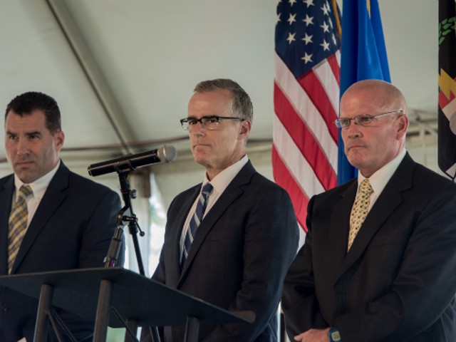 Acting FBI Director Andrew McCabe (center) was once a law student at Washington University.