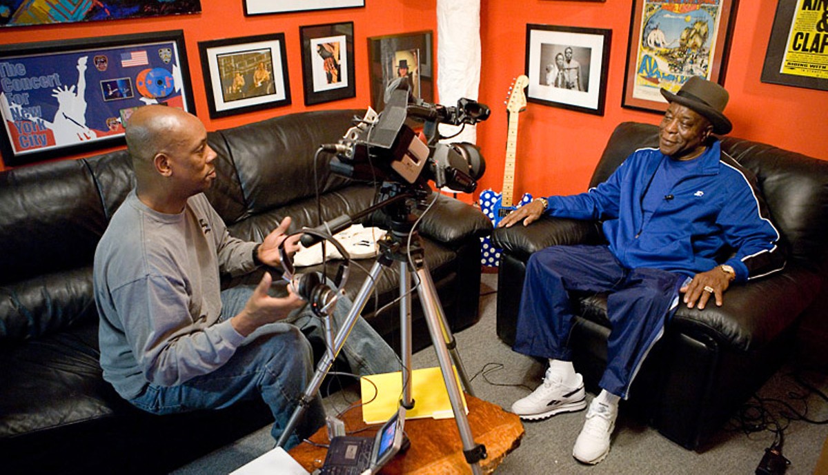 Art Holliday interviewing Buddy Guy.
