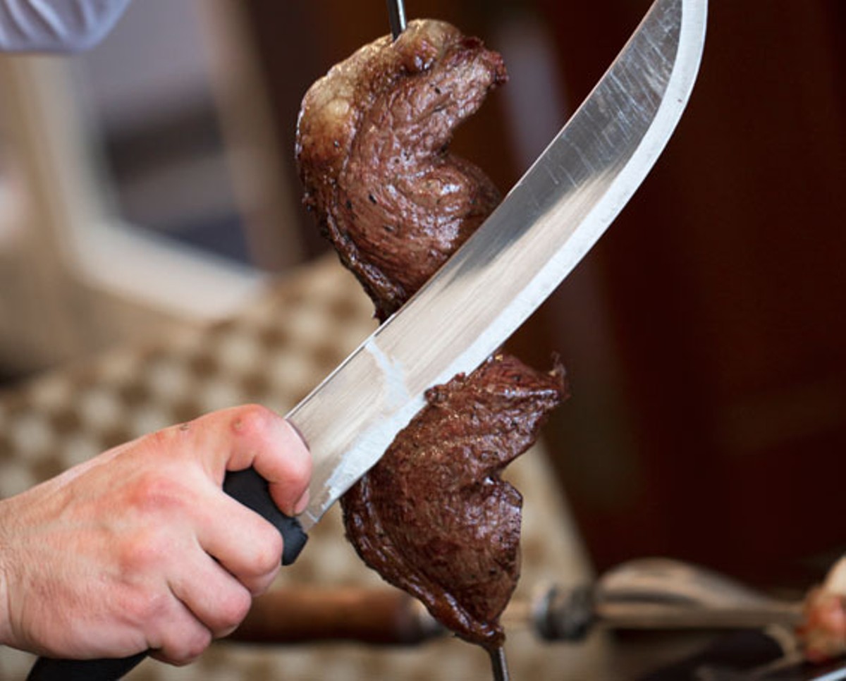 A skewer of Brazikat's picanha, a traditional Brazilian cut of beef.