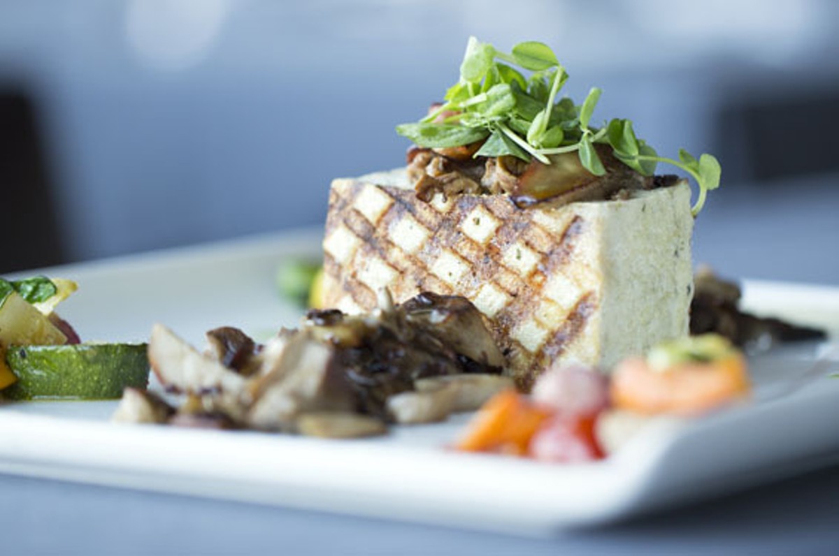 "Tofu: Marinated, Pressed, Grilled" brings roasted Ozark mushrooms, paired with petit root vegetables and two celery coulis. See also: Panorama Restaurant Photos.