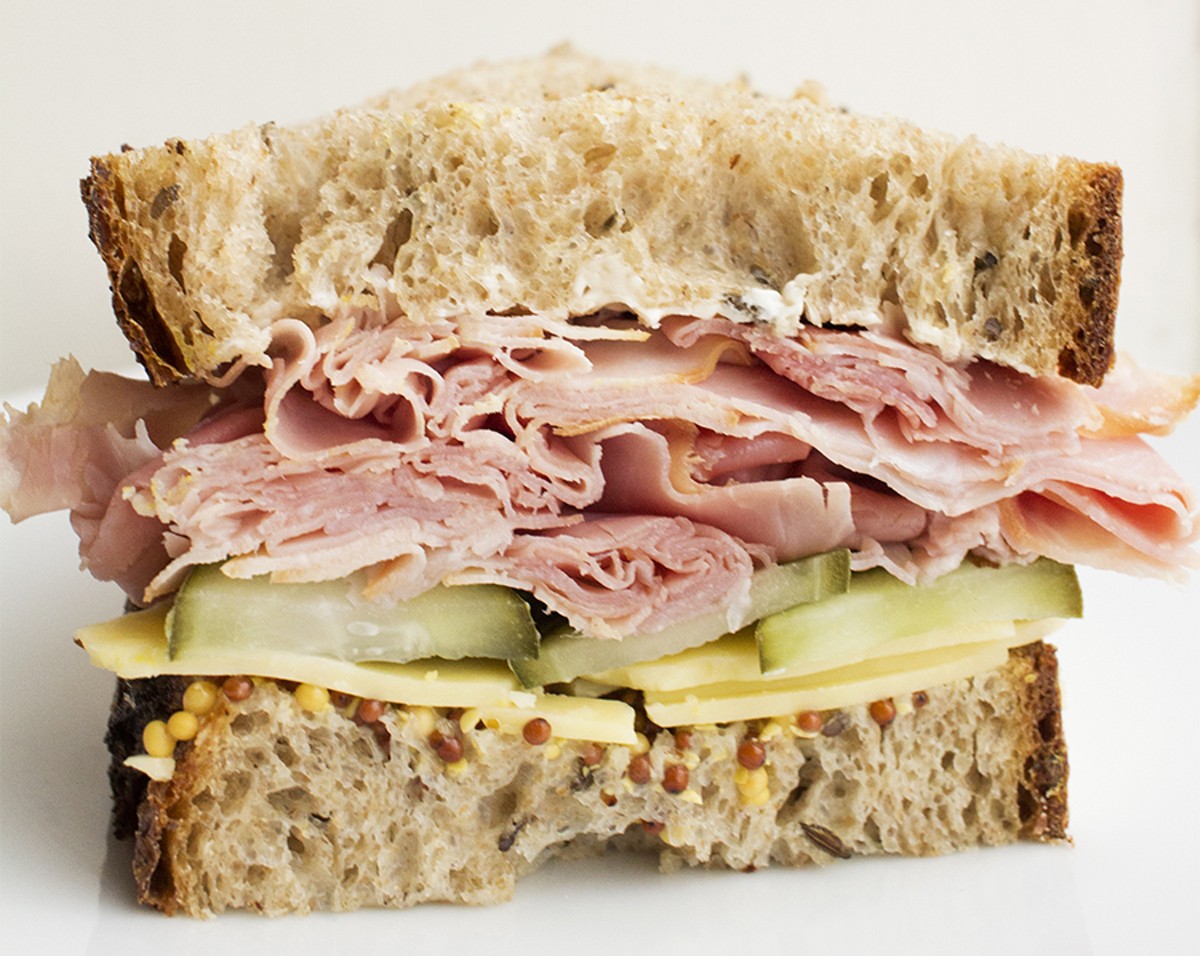 The interplay of caraway and dill elevate this ham and cheese on rye to the stratosphere.