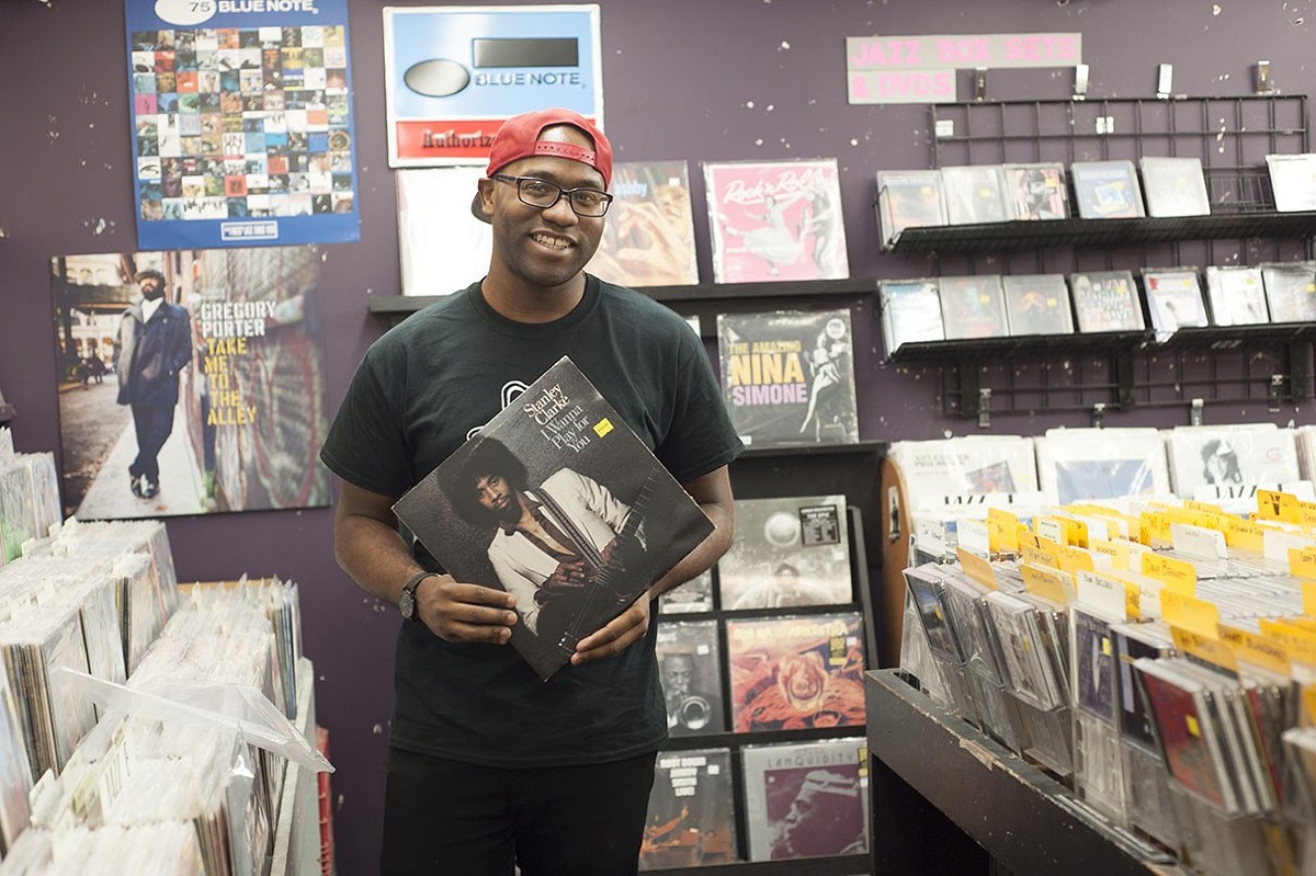 Orlandez Lewis first got hired at Vintage Vinyl — his "dream job" — at the age of eighteen.