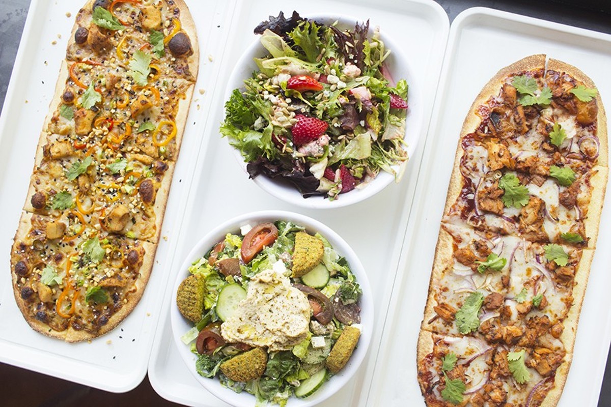 Pies at 'Zza include the "Thai Dye" (left) and "Postrio" (right), as well salads and even a poke bowl.