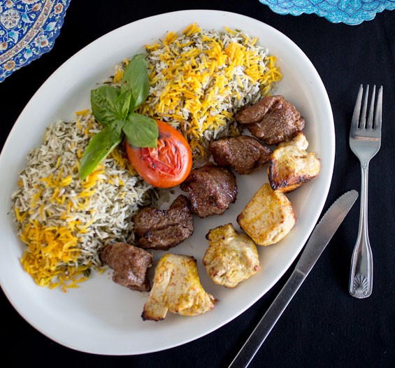 Beef and chicken shish kabob served with dill herb rice.