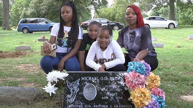 Michael Brown's family visits his resting place.