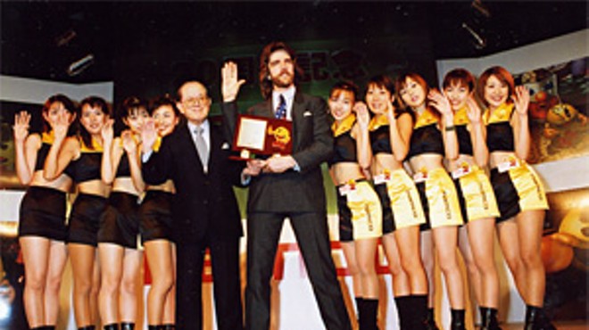 Billy Mitchell: Living the dream, complete with Pac-Man Girls.