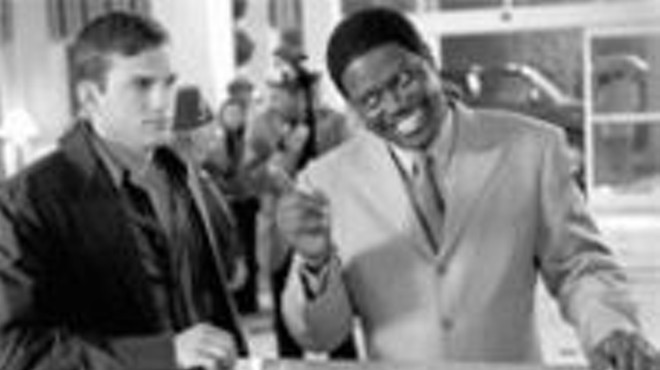 Fatherly advice: Bernie Mac (right) tells Ashton 
    Kutcher (left) a thing or two.