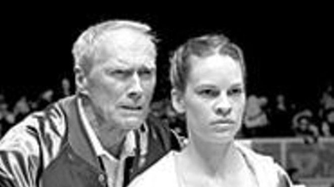 Fighting chance: Clint Eastwood (left) and Hilary 
    Swank (right) give knockout performances.