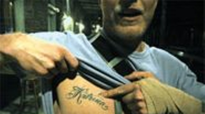 New Orleans residents didn't (and haven't) let Katrina sink 
    their spirits. In fact, NOLA resident Joshua wears his 
    defiance as a tattooed badge of pride.