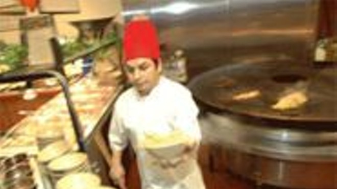 Hot stuff: Chef Yue Fei mans the Mongolian barbecue station.