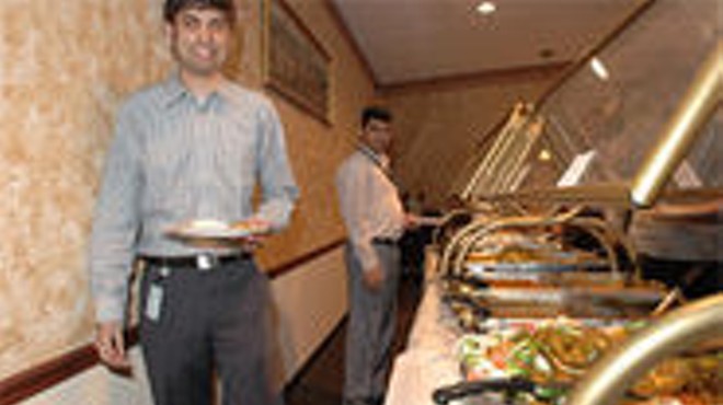 Bobby Vaitla joins a co-worker at Flavor of India's excellent lunch buffet.