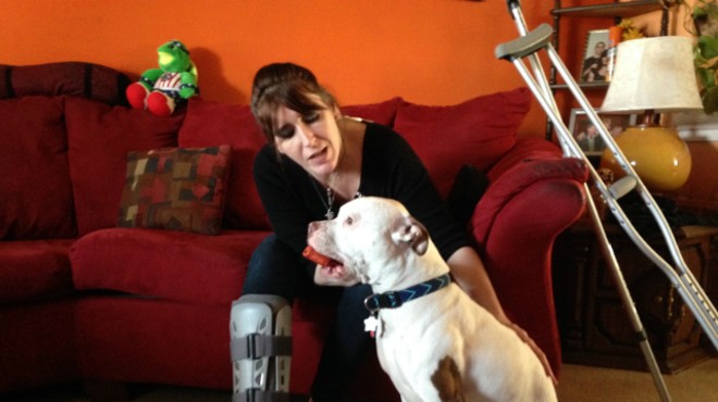 Peggy Cobb with King less than two months after a St. Louis cop shot her in the leg.