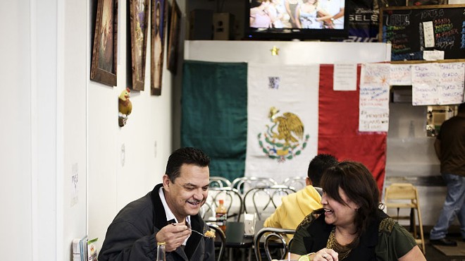 Tony and Brenda Garcia, owners of La Tejana, take time out for a quick lunch.