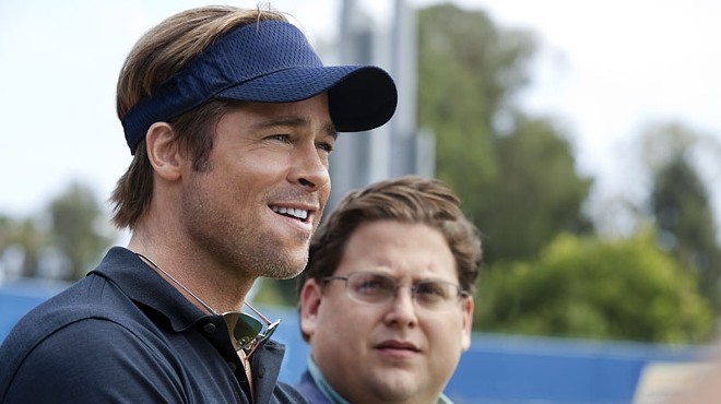 Playing small ball: Brad Pitt and Jonah Hill do a lot with a little in Moneyball.