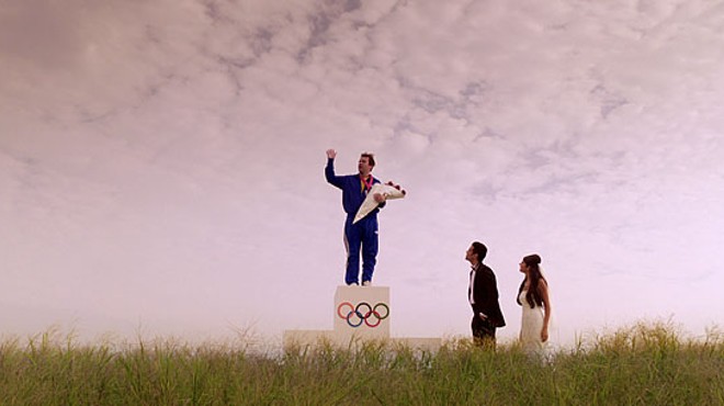 Atop a bookshelf or a podium for Olympic dustbusting? In dreams, it's hard to say.