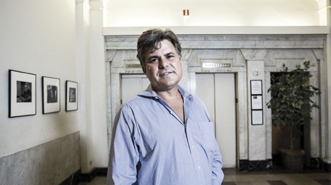After buying the Mark Twain Hotel in 1995, Amos Harris moved in on the eighth floor.