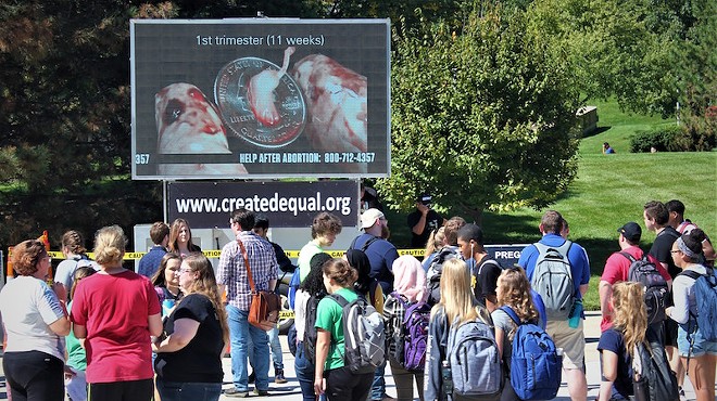 Students at the University of Toledo are confronted by photos graphically depicting abortion.