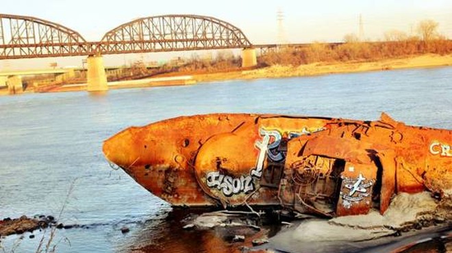 Graffiti Artists Tag U.S.S. Inaugural as River Waters Recede