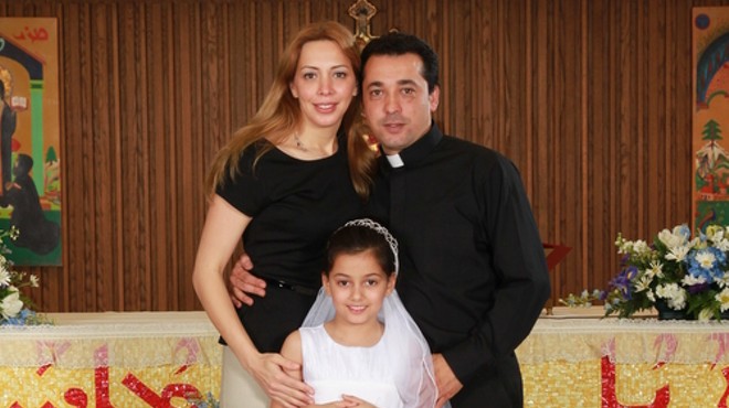 Deacon Wissam Akiki with his wife, Manal, and daughter, Perla.